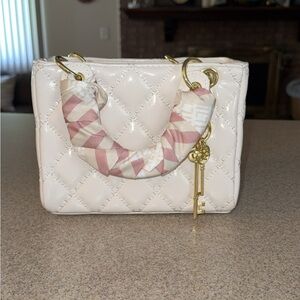 Elegant Cream Quilted Handbag with Pink Accents